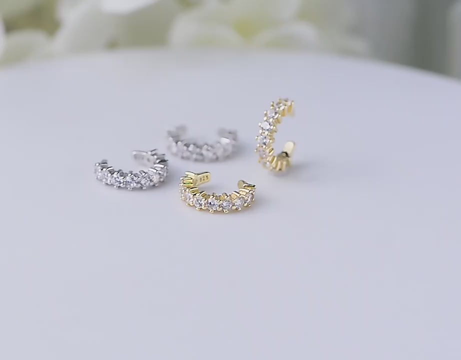 cubic zirconia earring with 14k gold setting